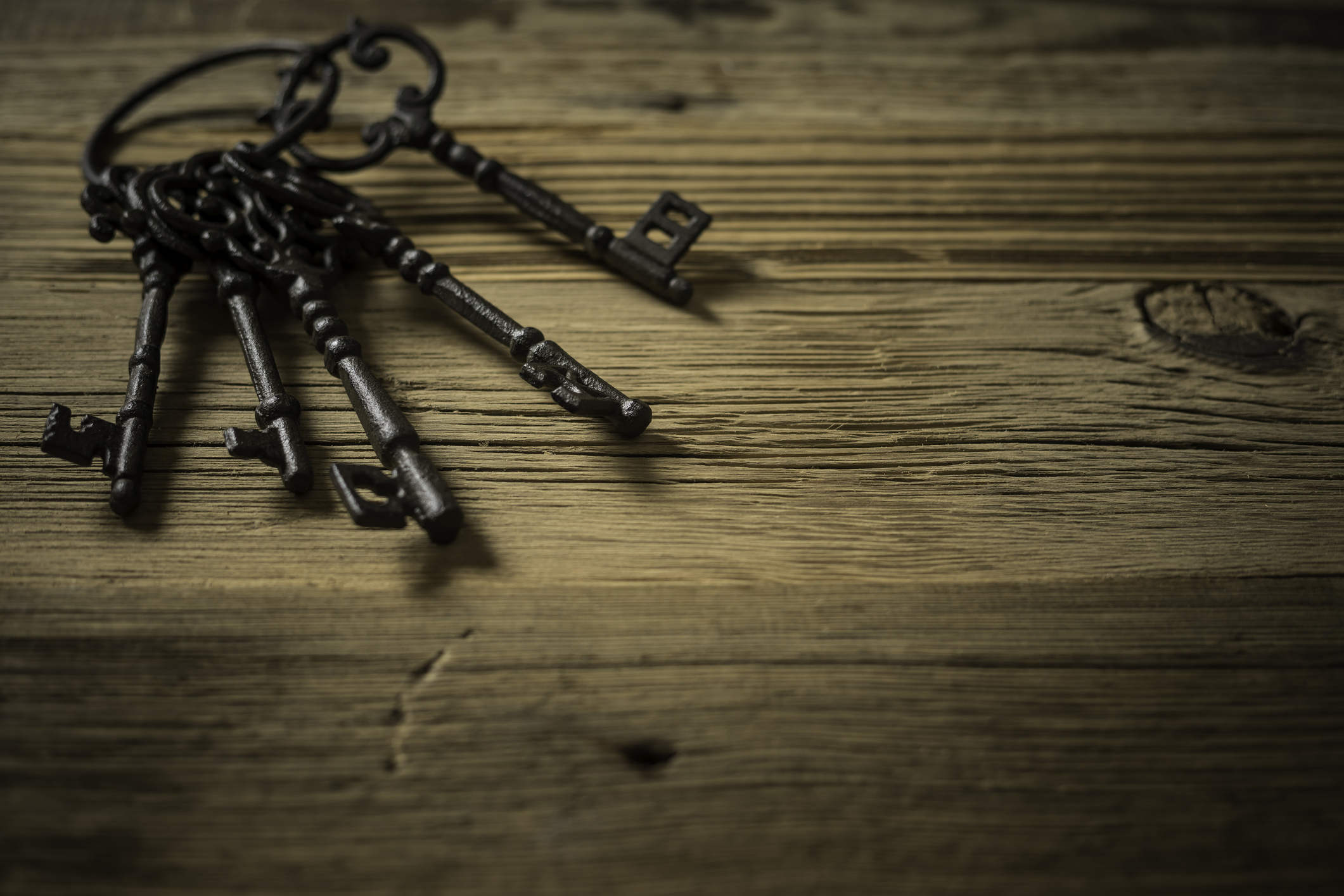 bunch of old rusty keys on key ring