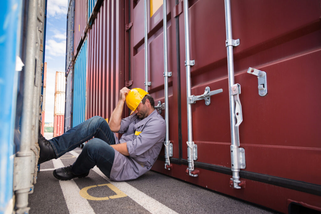 adult worker in large container port, sleeping