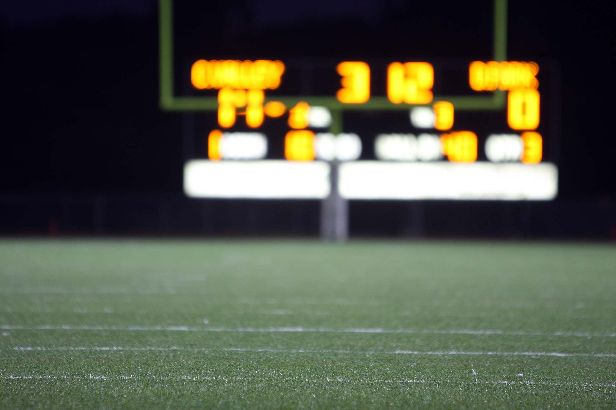 High school football score seen from distance