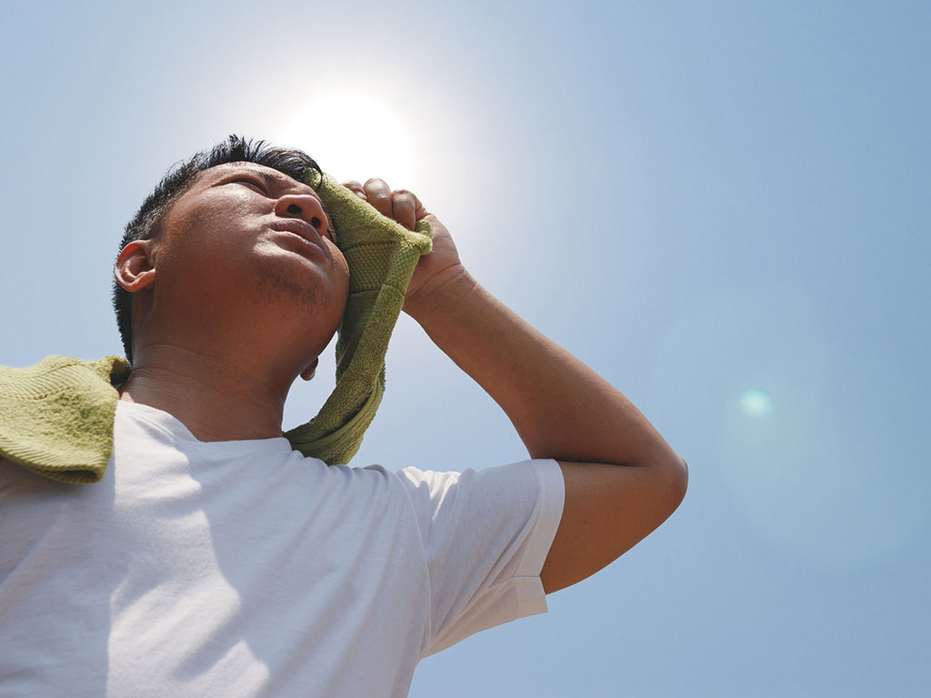 Young man and heat stroke.