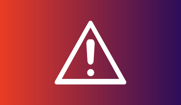 White exclamation mark inside a triangle on a red to purple gradient background, representing an alert notification related to Safety Data Sheets management.
