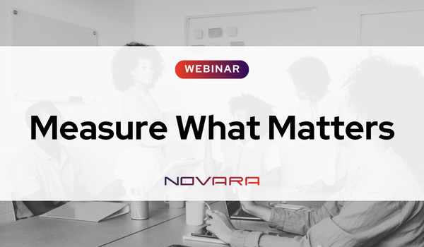 A group of people in a meeting room with a banner that reads: "WEBINAR: Measure What Matters - NOVARA," discussing key strategies for effective measurement.