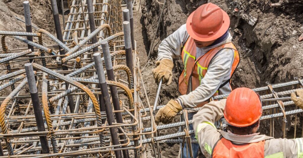 construction-workers-laying-the-foundation-with-iron-rods (1)