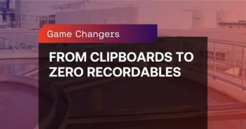 Text graphic with the headline "From clipboards to zero recordables" and a label reading "Game Changers," set over an industrial background, highlighting a safety transformation.